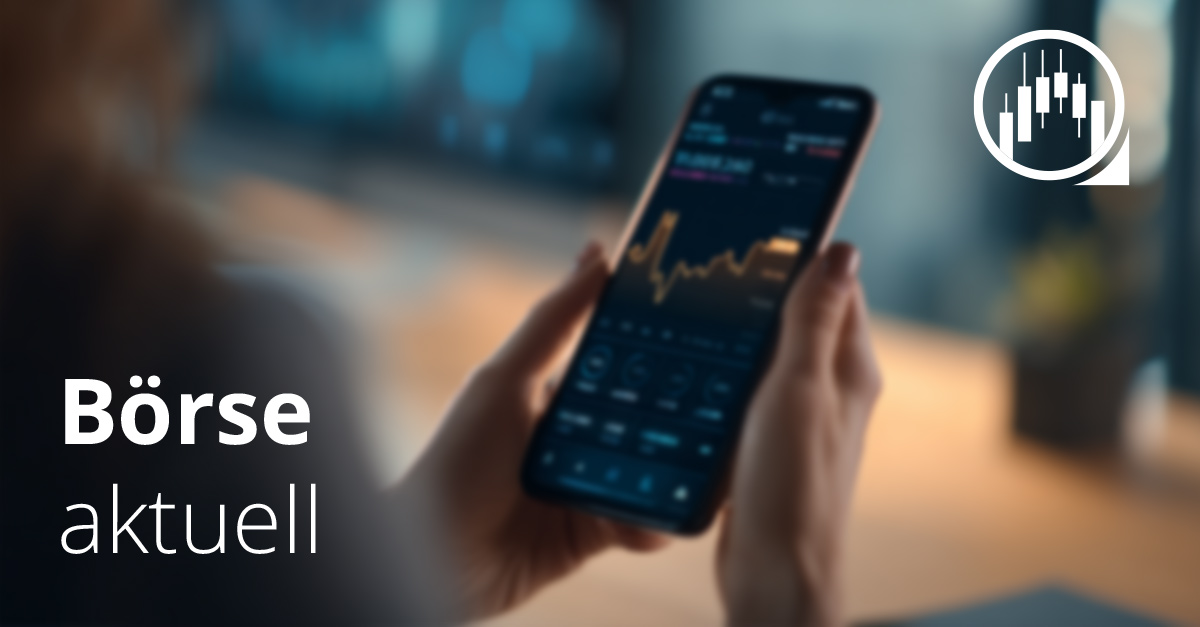 Person hält Smartphone mit Börsen-App, auf dem ein Kursanstieg angezeigt wird – Symbolbild für aktuelle Entwicklungen an der Börse.